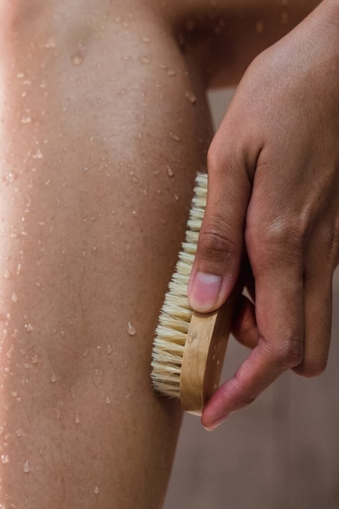 close up shot of a person using a body brush